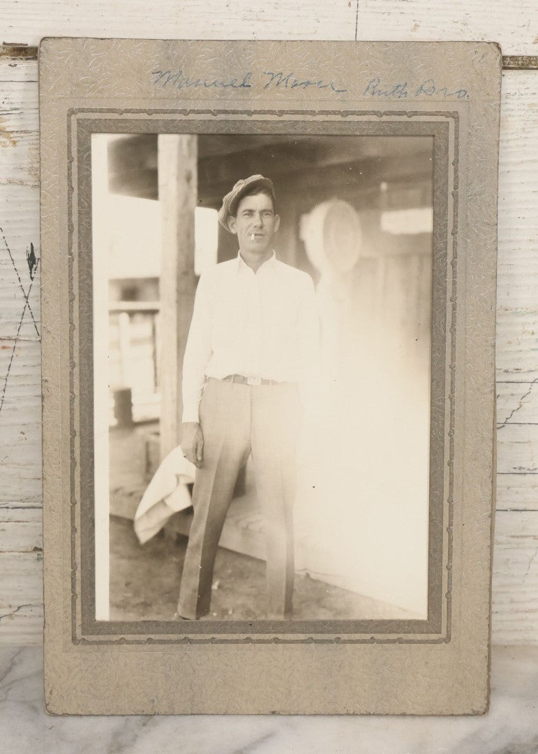 Lot 127 - Vintage Occupational Photograph In Paper Slip Frame Of Gas Station Attendant Emmanuel "Manuel" Moore Enjoying A Cigarette, Photo Labeled Ruth Pond