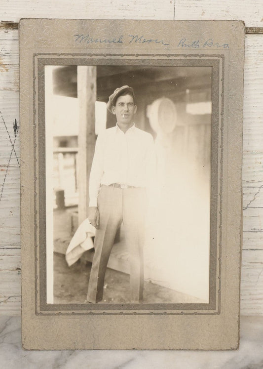 Lot 127 - Vintage Occupational Photograph In Paper Slip Frame Of Gas Station Attendant Emmanuel "Manuel" Moore Enjoying A Cigarette, Photo Labeled Ruth Pond