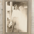 Lot 127 - Vintage Occupational Photograph In Paper Slip Frame Of Gas Station Attendant Emmanuel "Manuel" Moore Enjoying A Cigarette, Photo Labeled Ruth Pond