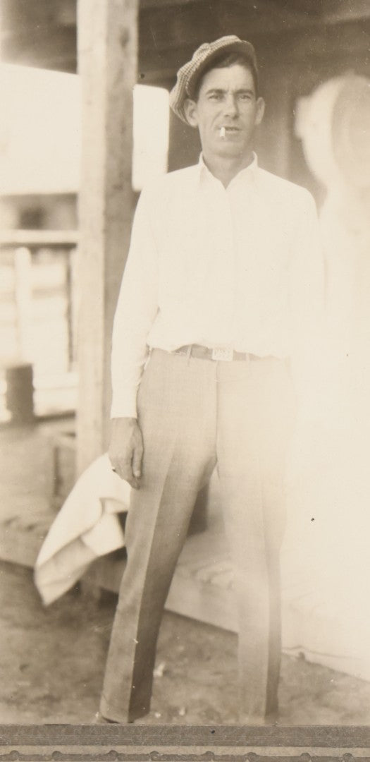 Lot 127 - Vintage Occupational Photograph In Paper Slip Frame Of Gas Station Attendant Emmanuel "Manuel" Moore Enjoying A Cigarette, Photo Labeled Ruth Pond