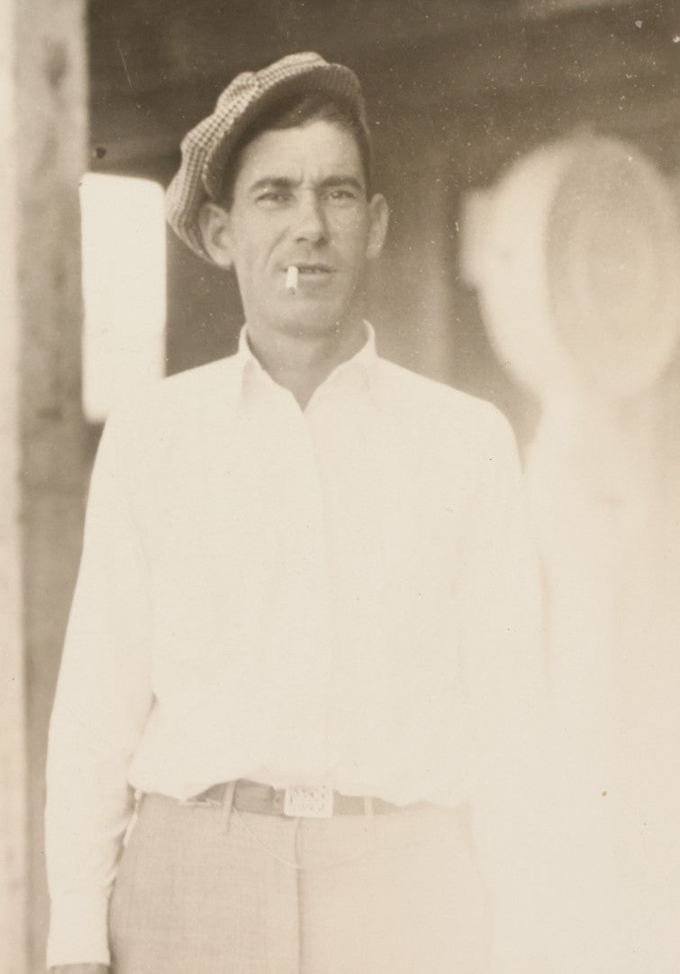 Lot 127 - Vintage Occupational Photograph In Paper Slip Frame Of Gas Station Attendant Emmanuel "Manuel" Moore Enjoying A Cigarette, Photo Labeled Ruth Pond