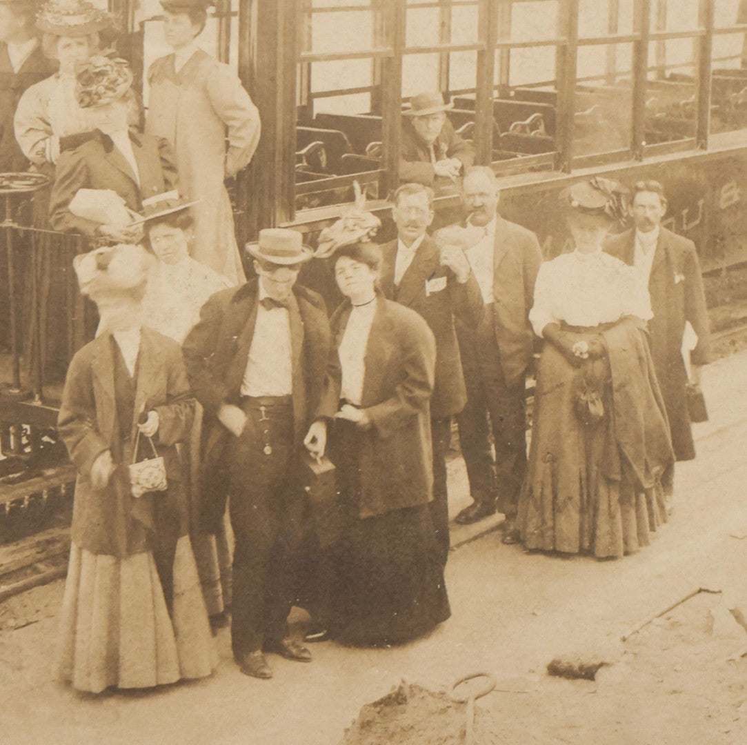 Lot 129 - Antique Boarded Souvenir Photograph Of Travelers Beside Rail Car On The Manitou & Pike's Peak Cog Railway, Rocky Mountains, Colorado, Photo By J.G. Hiestand, Official Photographer, Dated 1907