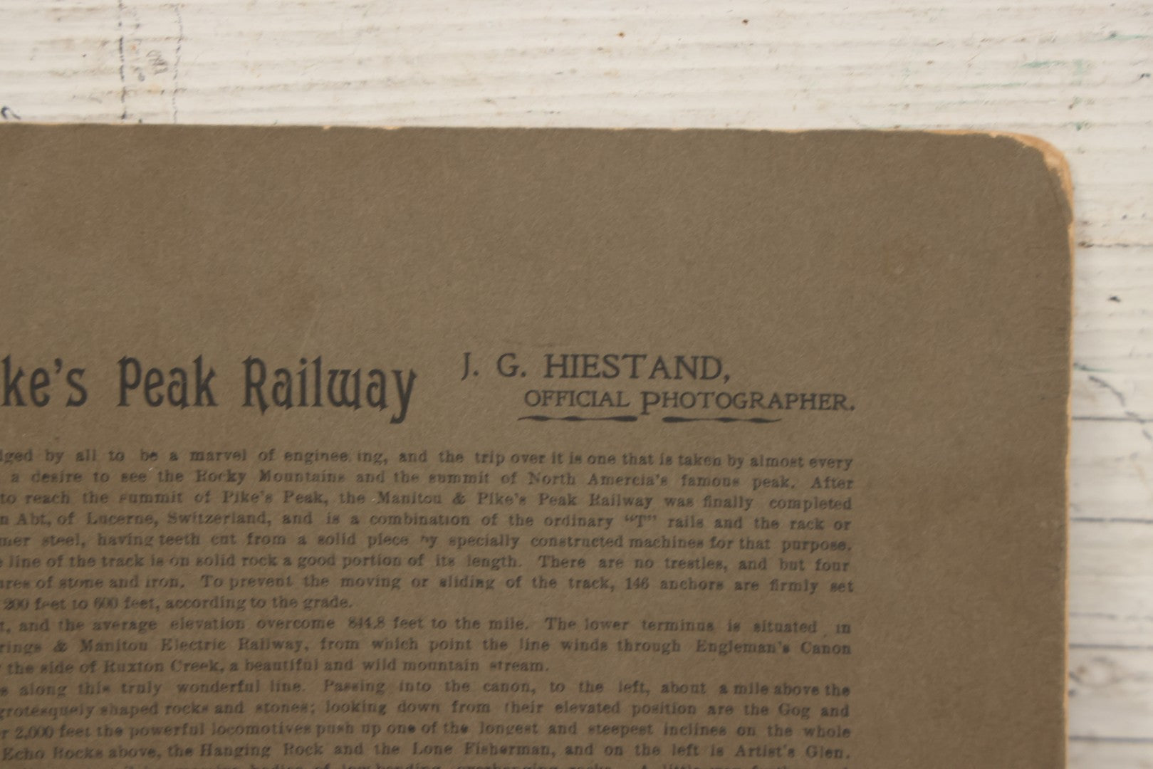 Lot 129 - Antique Boarded Souvenir Photograph Of Travelers Beside Rail Car On The Manitou & Pike's Peak Cog Railway, Rocky Mountains, Colorado, Photo By J.G. Hiestand, Official Photographer, Dated 1907