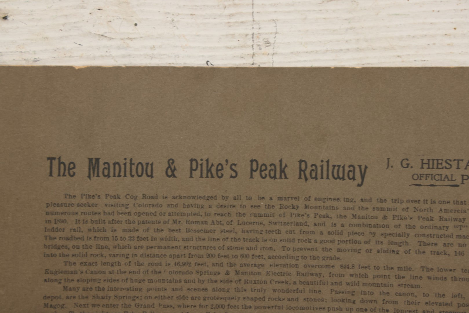 Lot 129 - Antique Boarded Souvenir Photograph Of Travelers Beside Rail Car On The Manitou & Pike's Peak Cog Railway, Rocky Mountains, Colorado, Photo By J.G. Hiestand, Official Photographer, Dated 1907