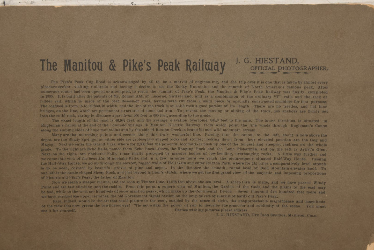 Lot 129 - Antique Boarded Souvenir Photograph Of Travelers Beside Rail Car On The Manitou & Pike's Peak Cog Railway, Rocky Mountains, Colorado, Photo By J.G. Hiestand, Official Photographer, Dated 1907