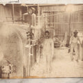 Lot 134 - Antique Boarded Occupational Photograph Of Two Filthy Workers Tending To An Industrial Boiler, Faint Pen Writing Indicates Date Of 1901-1902 And Other Information