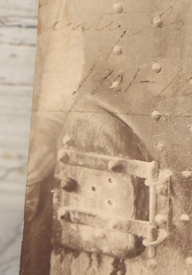 Lot 134 - Antique Boarded Occupational Photograph Of Two Filthy Workers Tending To An Industrial Boiler, Faint Pen Writing Indicates Date Of 1901-1902 And Other Information