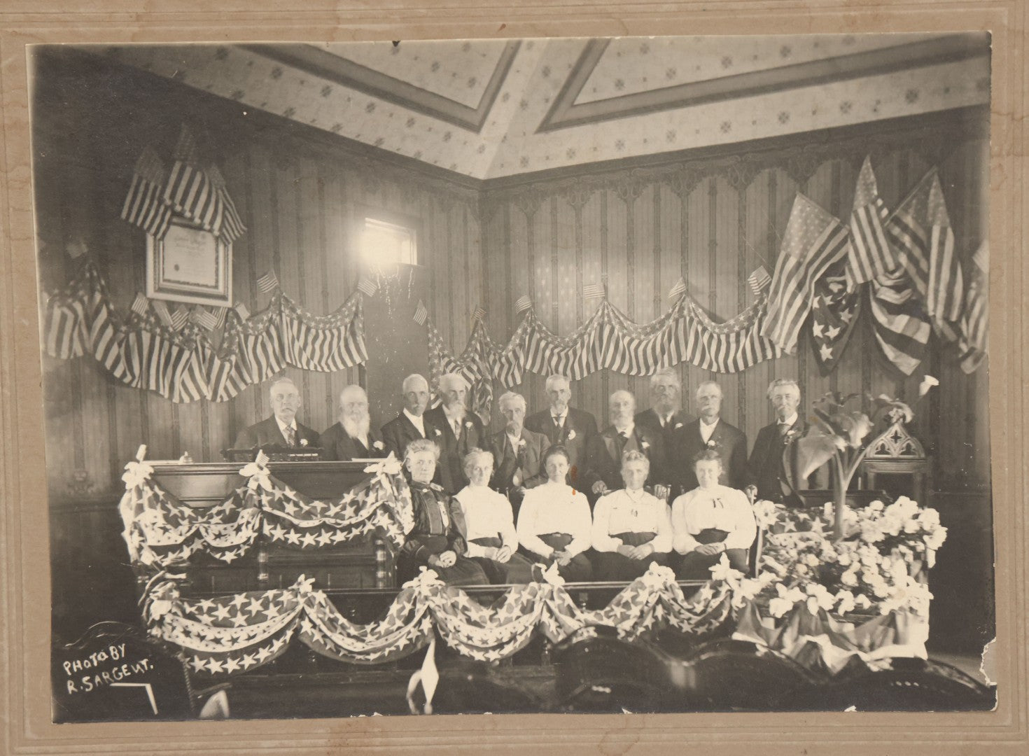 Lot 136 - Antique Boarded Photograph Of Elderly Men And Women At Patriotic Celebration, Likely A Civil War Reunion, Photographed By R. Sargent, Note On Verso States "Think This Is Me"