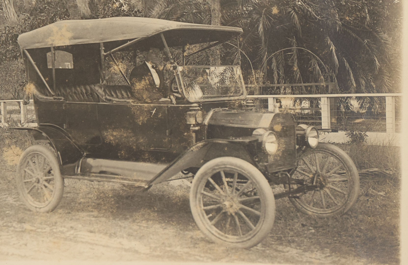 Lot 141 - Pair Of Antique Boarded Photographs Including Man And Woman Couple Posing Beside Early Automobile, Woman Does Not Look Thrilled And Man Seems To Know It, And Man Driving Away Without Her