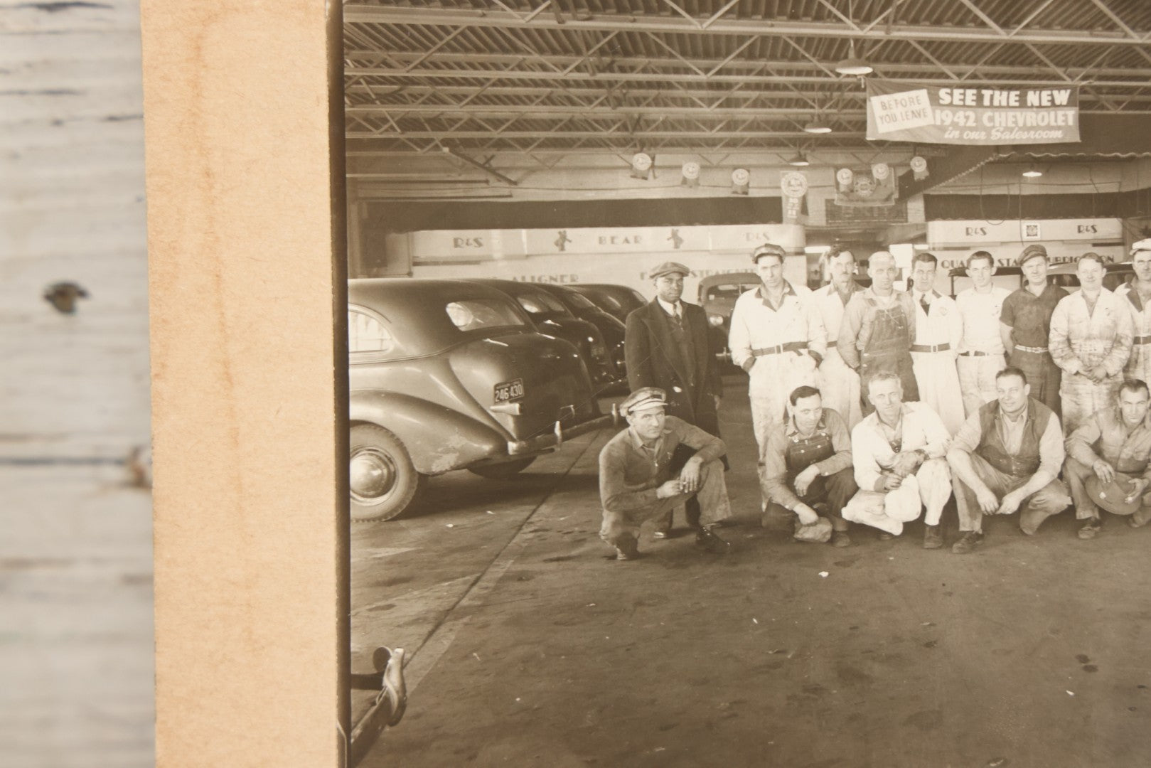 Lot 145 - Vintage Boarded Occupational Photograph Of Mechanics And Workers At A Chevrolet Dealership And Sales Room, Photo Taken On November 13, 1941, Photographed On Eastman Kodak Safety Film
