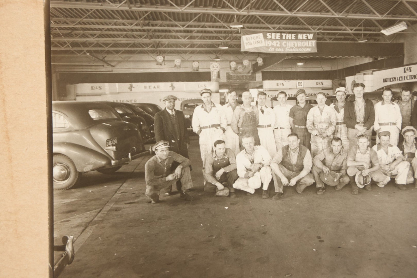 Lot 145 - Vintage Boarded Occupational Photograph Of Mechanics And Workers At A Chevrolet Dealership And Sales Room, Photo Taken On November 13, 1941, Photographed On Eastman Kodak Safety Film