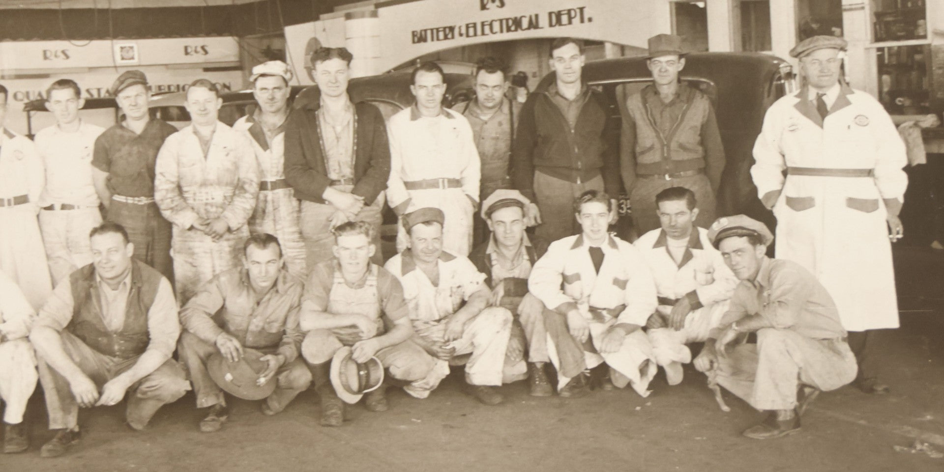 Lot 145 - Vintage Boarded Occupational Photograph Of Mechanics And Workers At A Chevrolet Dealership And Sales Room, Photo Taken On November 13, 1941, Photographed On Eastman Kodak Safety Film