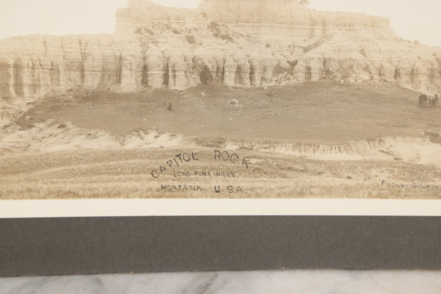 Lot 148 - Antique Boarded Panoramic Photograph Of Capitol Rock, Long Pine Hills, Montana, Photographed By Gilbertson