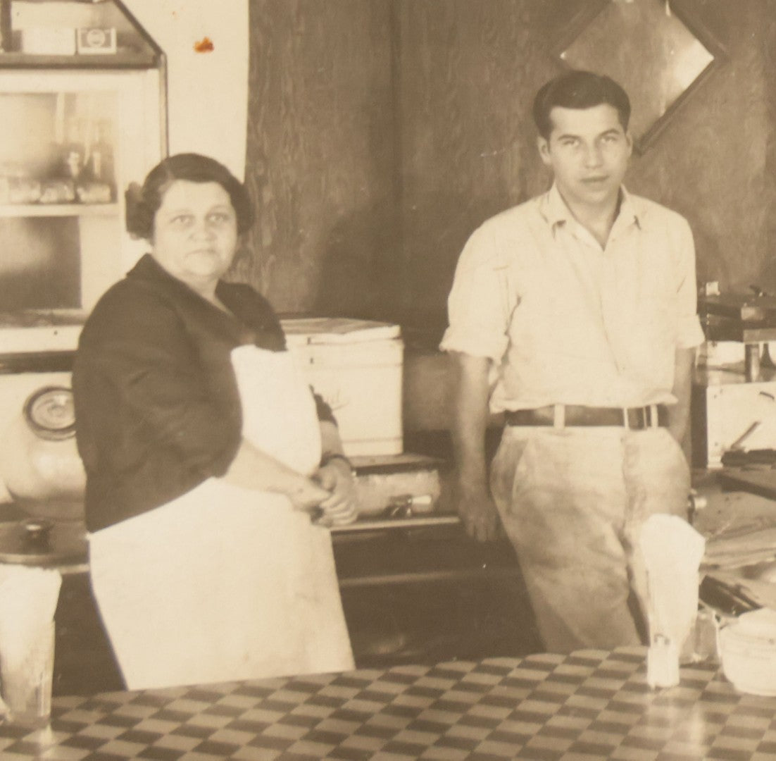 Lot 150 - Vintage Occupational Photograph In Paper Slip Frame Of Man And Woman Working The Counter At A Diner, Identified As "Grandma" And Henry