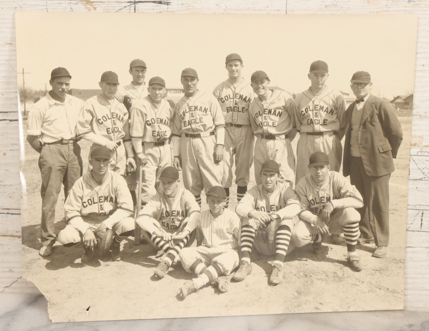 Lot 151 - Vintage Unmounted Large Format Photograph Of Coleman & Eagle Baseball Team In Uniforms Posing With Coaches And Ballboy, Wearing Very Stylish Striped Socks, Note Loss To Bottom Left