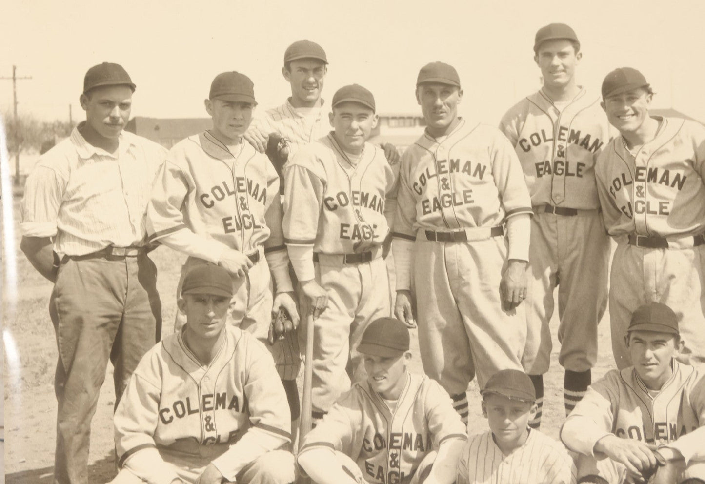 Lot 151 - Vintage Unmounted Large Format Photograph Of Coleman & Eagle Baseball Team In Uniforms Posing With Coaches And Ballboy, Wearing Very Stylish Striped Socks, Note Loss To Bottom Left