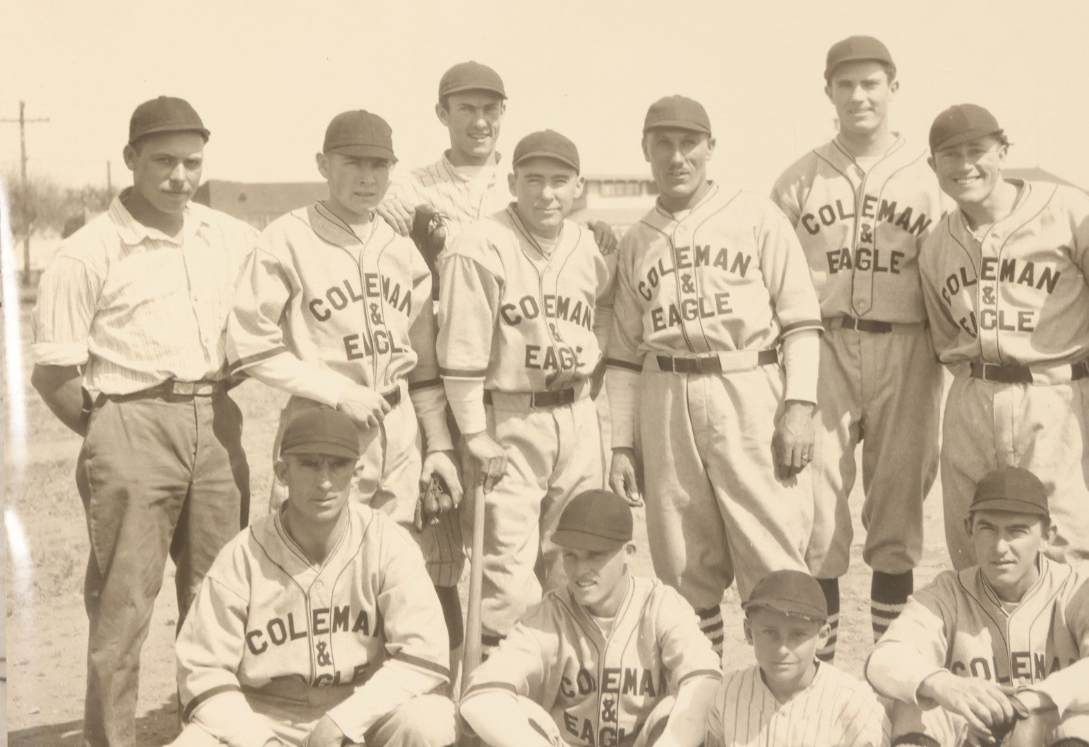 Lot 151 - Vintage Unmounted Large Format Photograph Of Coleman & Eagle Baseball Team In Uniforms Posing With Coaches And Ballboy, Wearing Very Stylish Striped Socks, Note Loss To Bottom Left