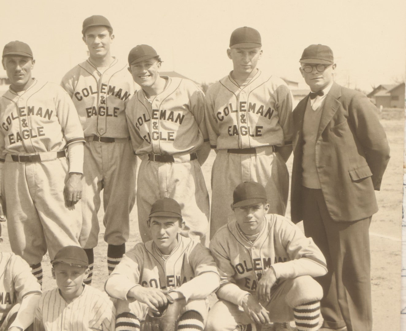 Lot 151 - Vintage Unmounted Large Format Photograph Of Coleman & Eagle Baseball Team In Uniforms Posing With Coaches And Ballboy, Wearing Very Stylish Striped Socks, Note Loss To Bottom Left