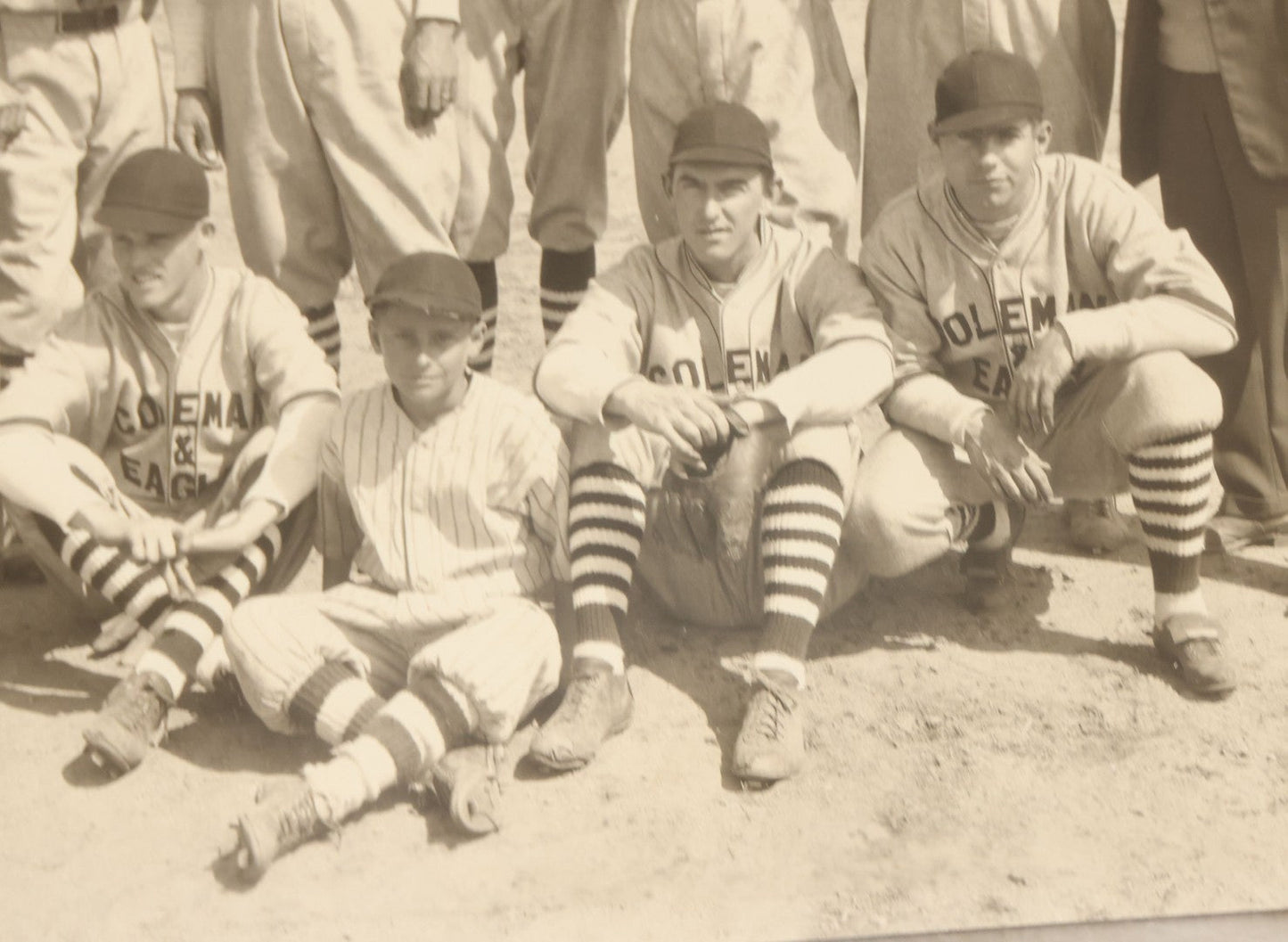 Lot 151 - Vintage Unmounted Large Format Photograph Of Coleman & Eagle Baseball Team In Uniforms Posing With Coaches And Ballboy, Wearing Very Stylish Striped Socks, Note Loss To Bottom Left