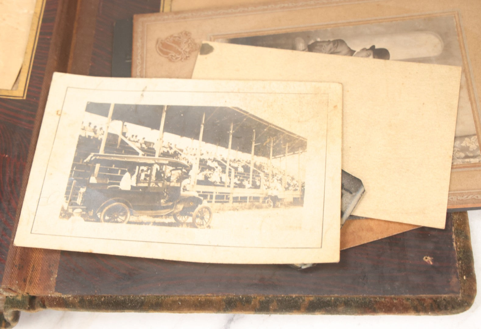 Lot 172 - Antique Victorian Portrait Photo Album With Good Luck Horseshoe Beveled Glass Mirror Cover, 30+ Cabinet Card Photographs, Assorted Loose Photos, Note Has Heavy Musty Smell
