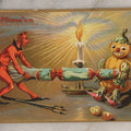 Lot 054 - Antique Embossed Halloween Postcard With Devil And Pumpkin Man Playing Tug-Of-War With Candy, Published By Raphael Tuck & Sons, Hallowe'En Post Cards Series No. 150, Printed In Saxony, Germany, Unused