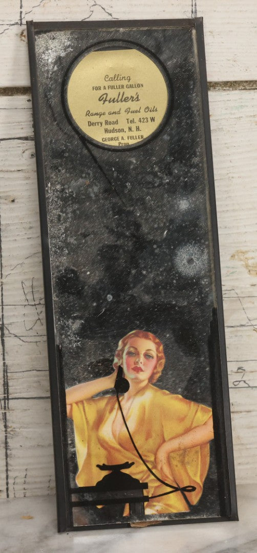 Lot 058 - Vintage Pin-Up Advertising Wall Mirror With Sexy Blonde Lady In Golden Gown On The Phone, Advertising Fuller's Range And Fuel Oils, Hudson, New Hampshire, George A. Fuller, Proprietor, 3-5/8" x 10-1/4"