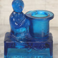 Lot 083 - Antique Molded Blue Glass Toothpick Holder With Magician Monkey Posing With Top Hat, Note Chip To Hat Rim