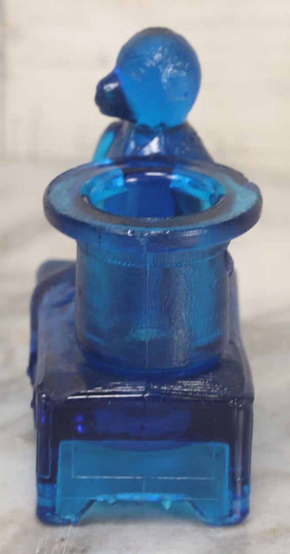 Lot 083 - Antique Molded Blue Glass Toothpick Holder With Magician Monkey Posing With Top Hat, Note Chip To Hat Rim