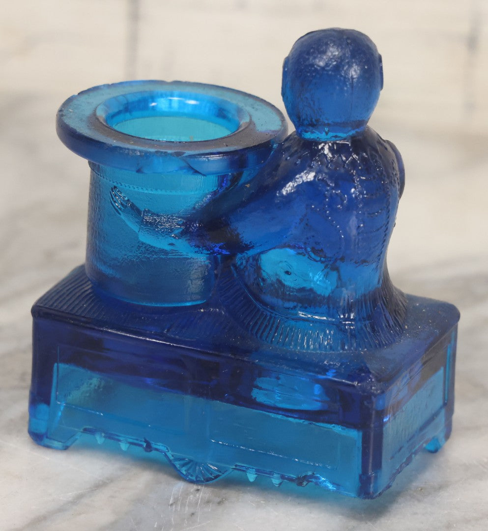 Lot 083 - Antique Molded Blue Glass Toothpick Holder With Magician Monkey Posing With Top Hat, Note Chip To Hat Rim