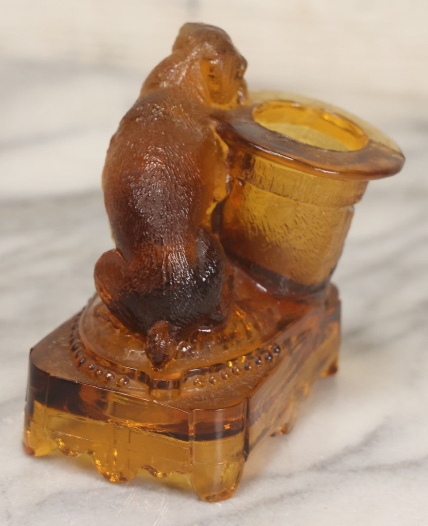Lot 084 - Antique Molded Orange Glass Toothpick Holder With Sa Dog Resting Chin On Top Hat, Note Chips To Interior Of Hat