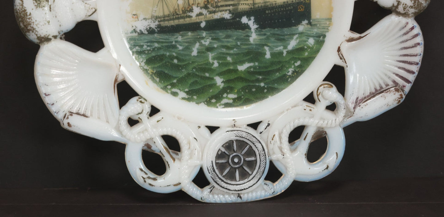 Lot 085 - Antique Milk Glass Collectible Souvenir Plate From The S.S. Deutschland, German Ocean Liner, Hamburg America Line (H.A.P.A.G.), With Lithographed Depiction Of Ship, Remnants Of Original Paint, Note Small Crack, 7-3/8" Diameter