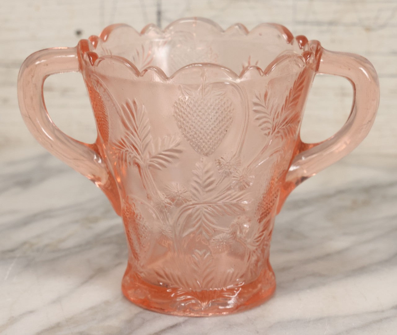 Lot 087 - Antique Pink Depression Glass Two Handled Vase Or Serving Vessel With Pressed Strawberries Pattern, 5" Height