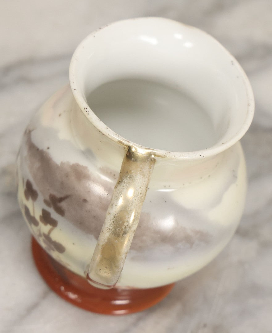 Lot 088 - Antique Royal Bayreuth Porcelain Creamer With White And Brown Cow Graphics, Painted Landscape Scene, 3-5/8" Height