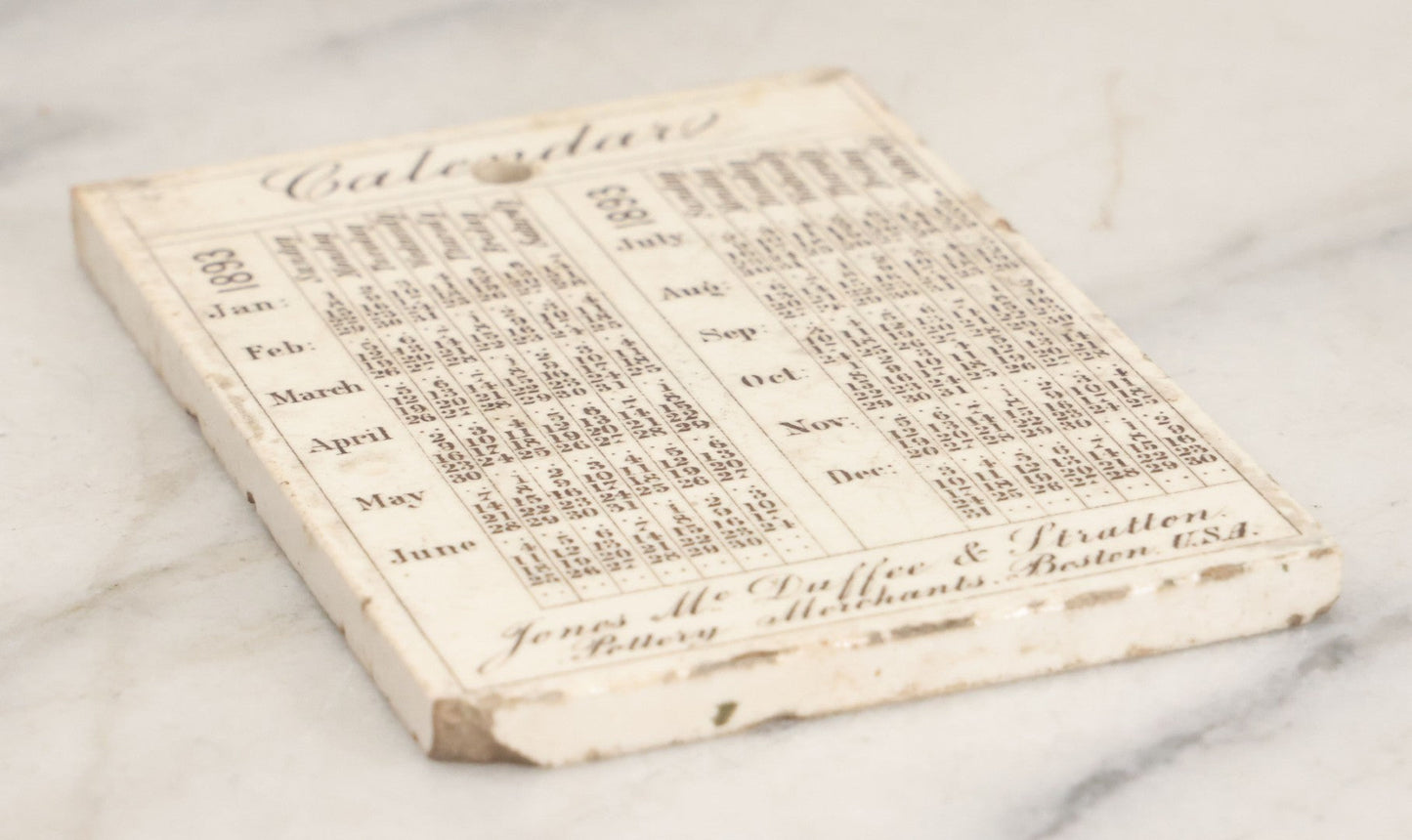 Lot 090 - Antique 1893 Calendar Tile With Image Of Independence Hall, Philadelphia, Advertising Jones, McDuffee & Stratton Co., Pottery Merchants, Boston, Manufactured By Wedgwood, Etruria, England