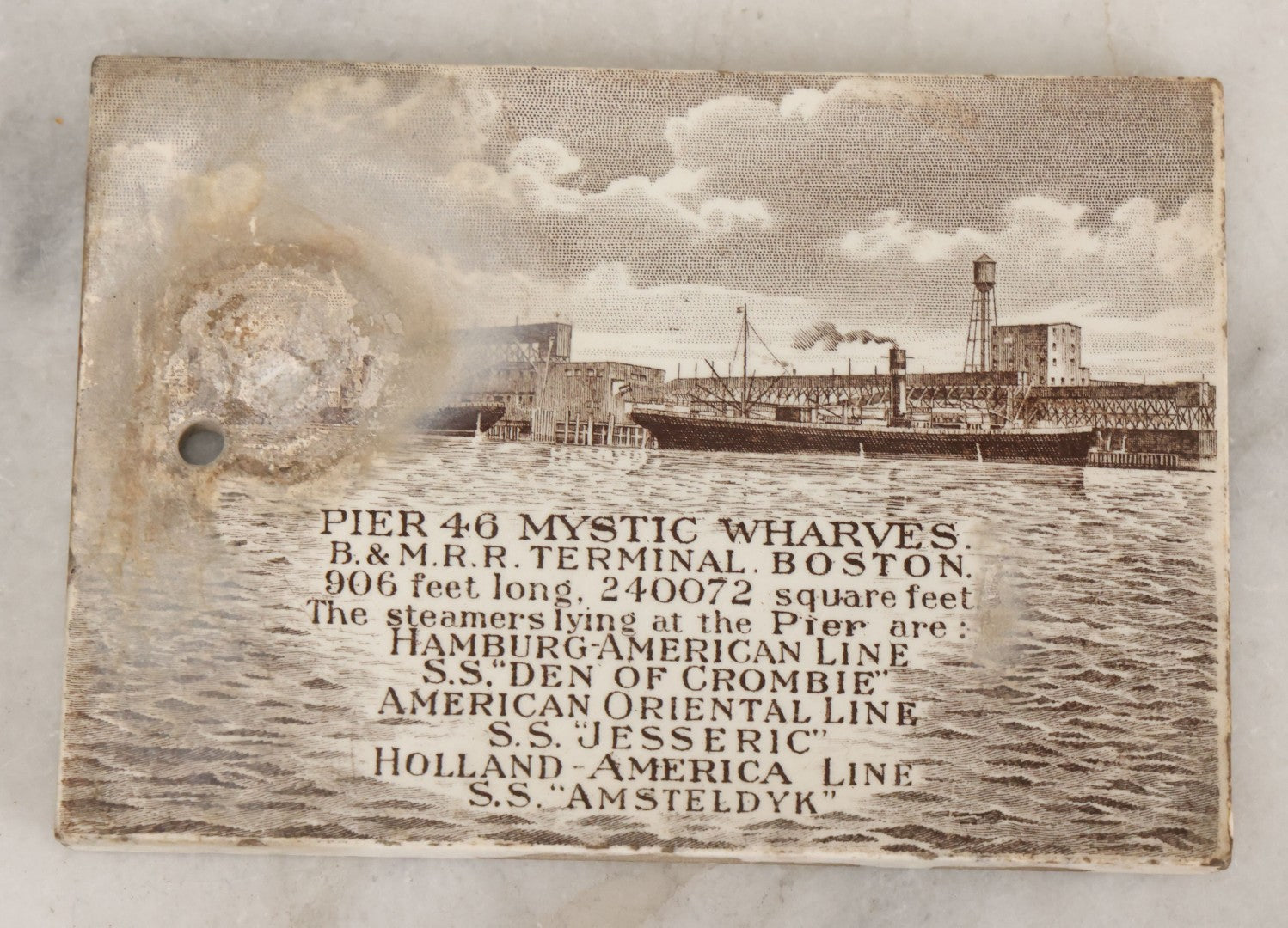 Lot 094 - Antique 1913 Calendar Tile With Image Of Pier 46 Mystic Wharves, Boston &  Maine Railroad Terminal, Boston, Advertising Jones, McDuffee & Stratton Corporation, Crockery, China, & Glass Merchants, Boston, Note Large Blemish, Left Side