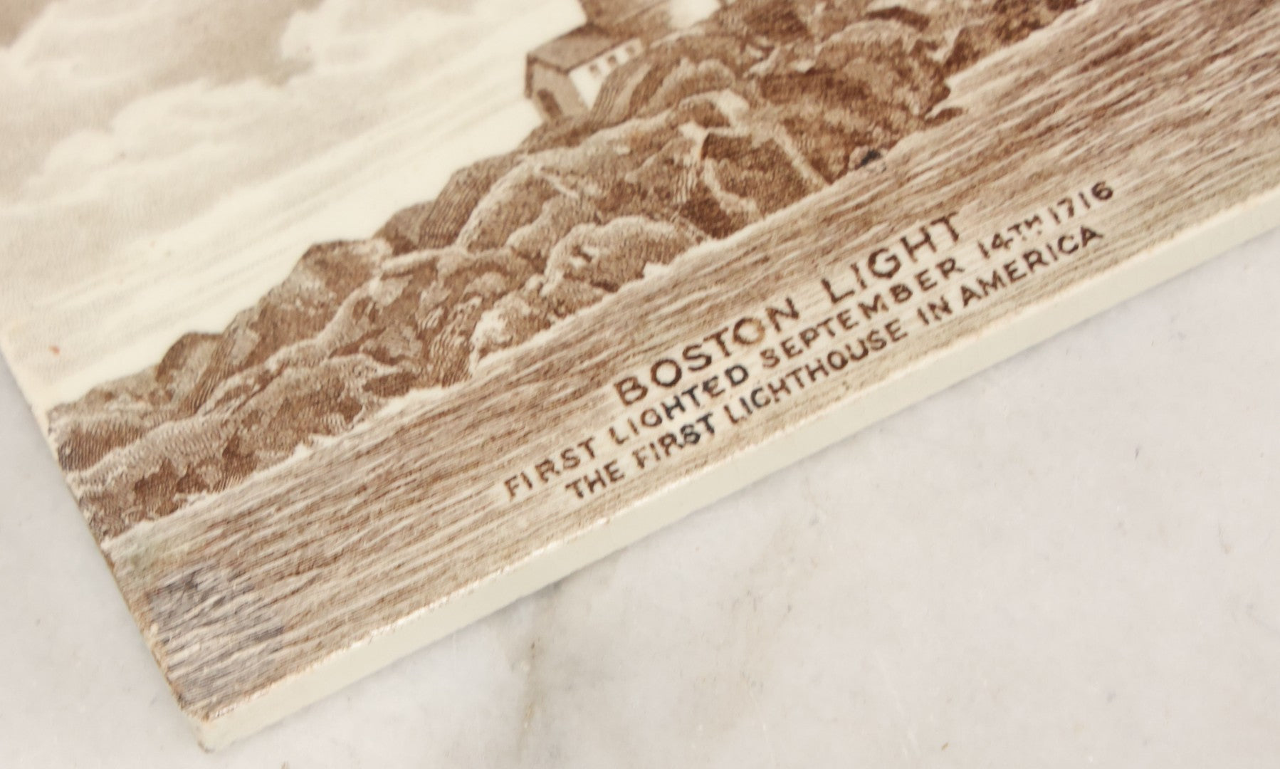 Lot 097 - Antique 1918 Calendar Tile With Image Of The Boston Light, First Lighthouse In America, Advertising Jones, McDuffee & Stratton Corporation, Crockery, China, & Glass Merchants, Boston, Manufactured By Wedgwood, Etruria, England