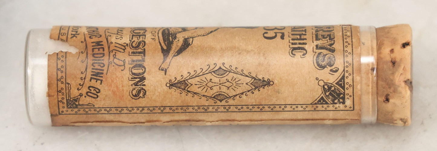 Lot 100 - Grouping Of Three Antique Medicine Pill Vials With Original Paper Labels, Corks, And Contents, Including Humphrey's Homeopathic No. 35., Burdock Pills, And Cartier's Little Liver Pills