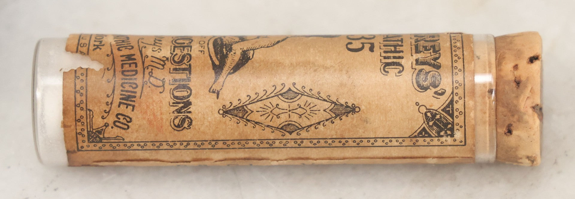 Lot 100 - Grouping Of Three Antique Medicine Pill Vials With Original Paper Labels, Corks, And Contents, Including Humphrey's Homeopathic No. 35., Burdock Pills, And Cartier's Little Liver Pills