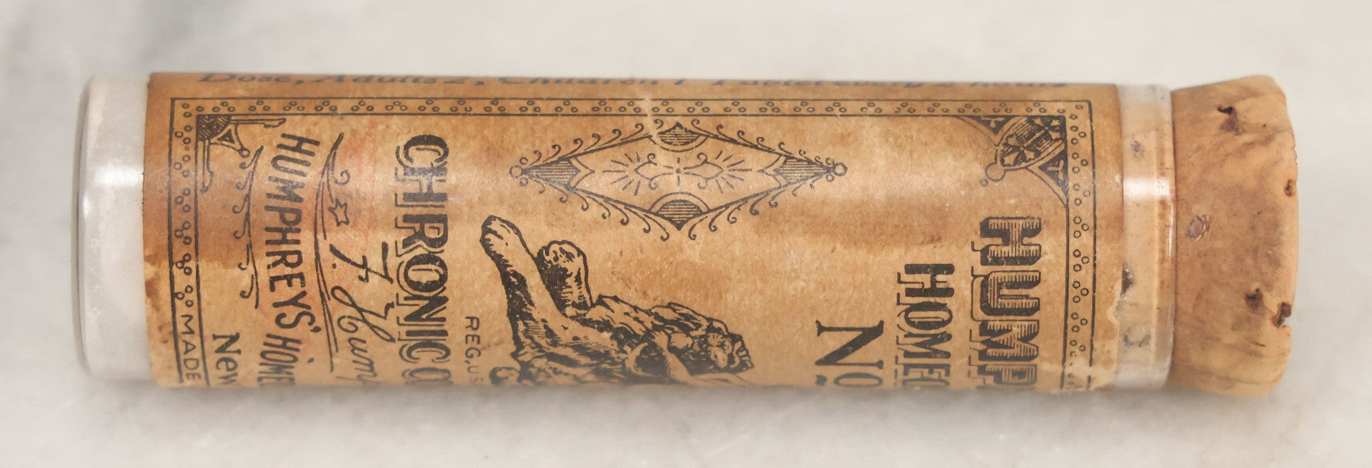 Lot 100 - Grouping Of Three Antique Medicine Pill Vials With Original Paper Labels, Corks, And Contents, Including Humphrey's Homeopathic No. 35., Burdock Pills, And Cartier's Little Liver Pills