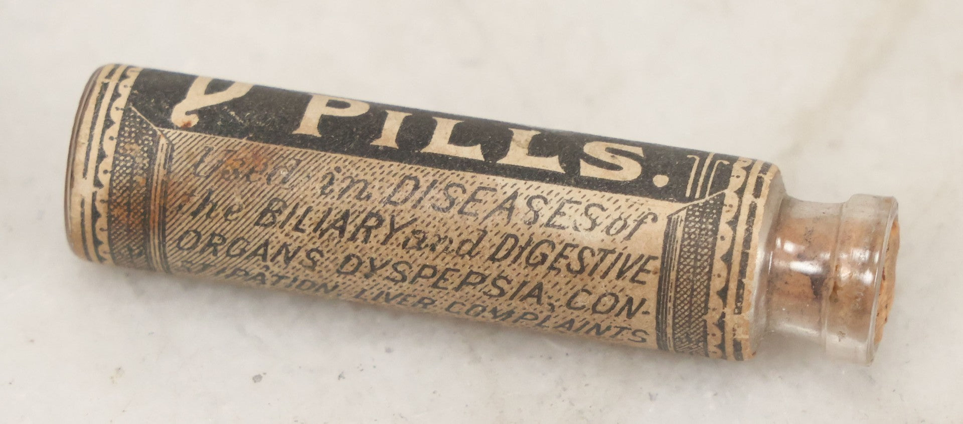 Lot 100 - Grouping Of Three Antique Medicine Pill Vials With Original Paper Labels, Corks, And Contents, Including Humphrey's Homeopathic No. 35., Burdock Pills, And Cartier's Little Liver Pills