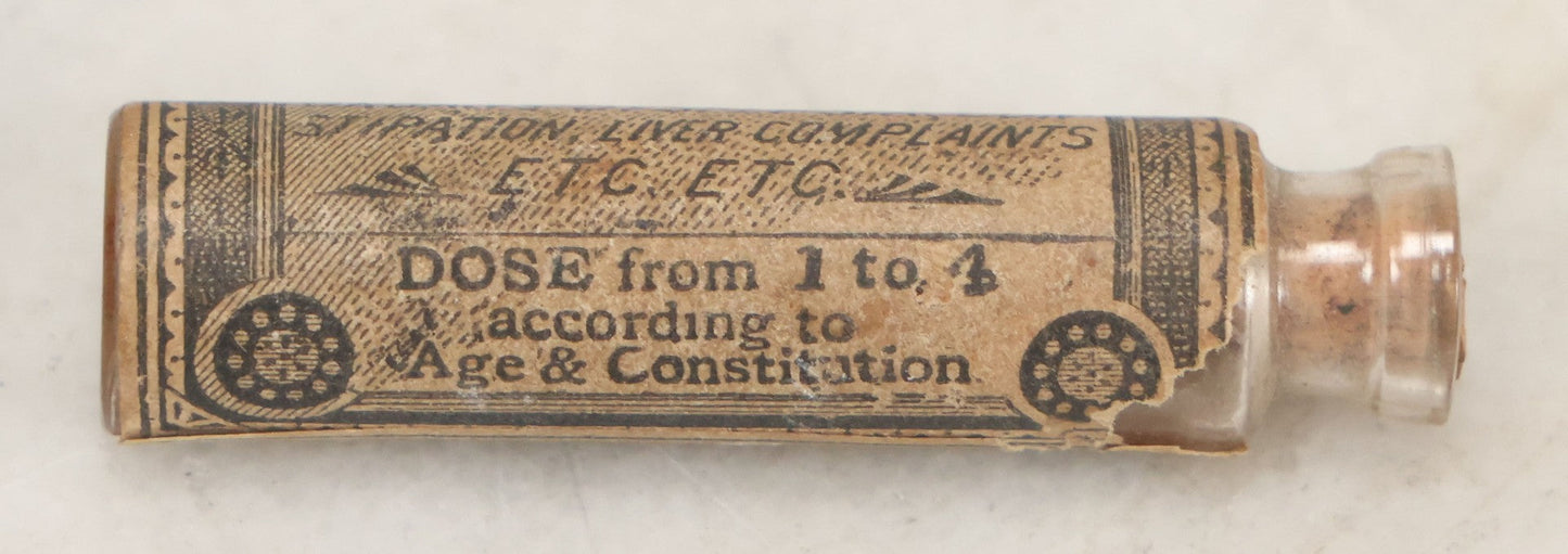 Lot 100 - Grouping Of Three Antique Medicine Pill Vials With Original Paper Labels, Corks, And Contents, Including Humphrey's Homeopathic No. 35., Burdock Pills, And Cartier's Little Liver Pills
