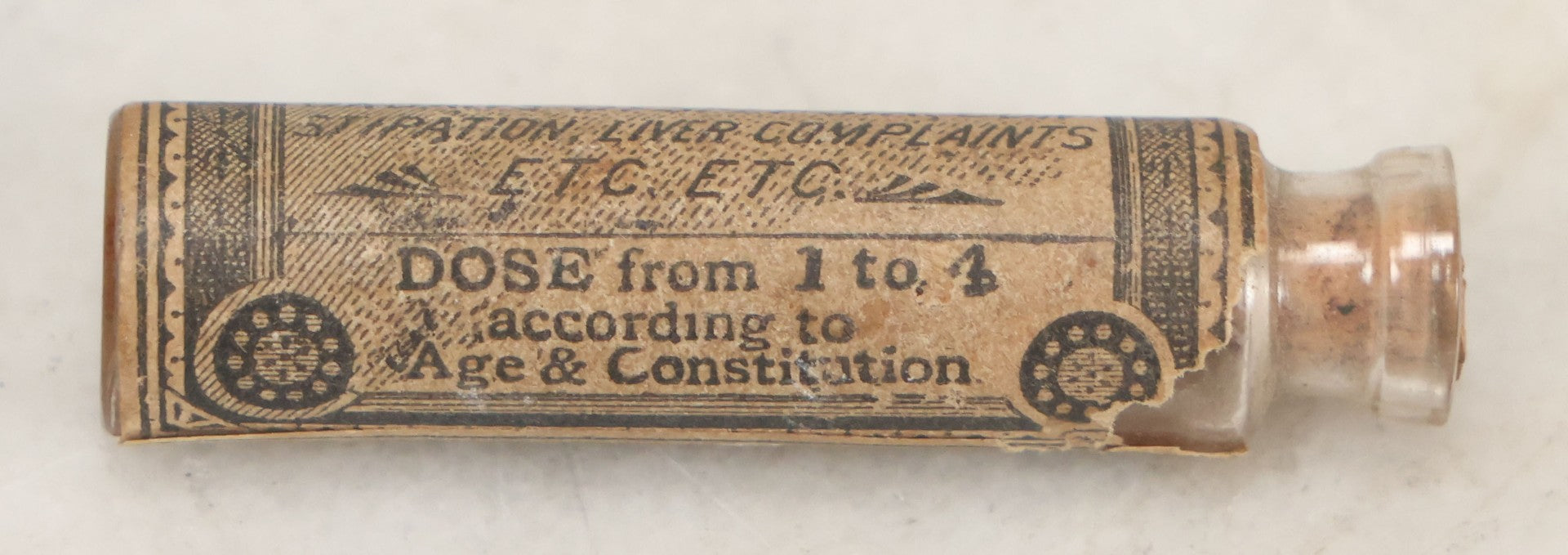 Lot 100 - Grouping Of Three Antique Medicine Pill Vials With Original Paper Labels, Corks, And Contents, Including Humphrey's Homeopathic No. 35., Burdock Pills, And Cartier's Little Liver Pills