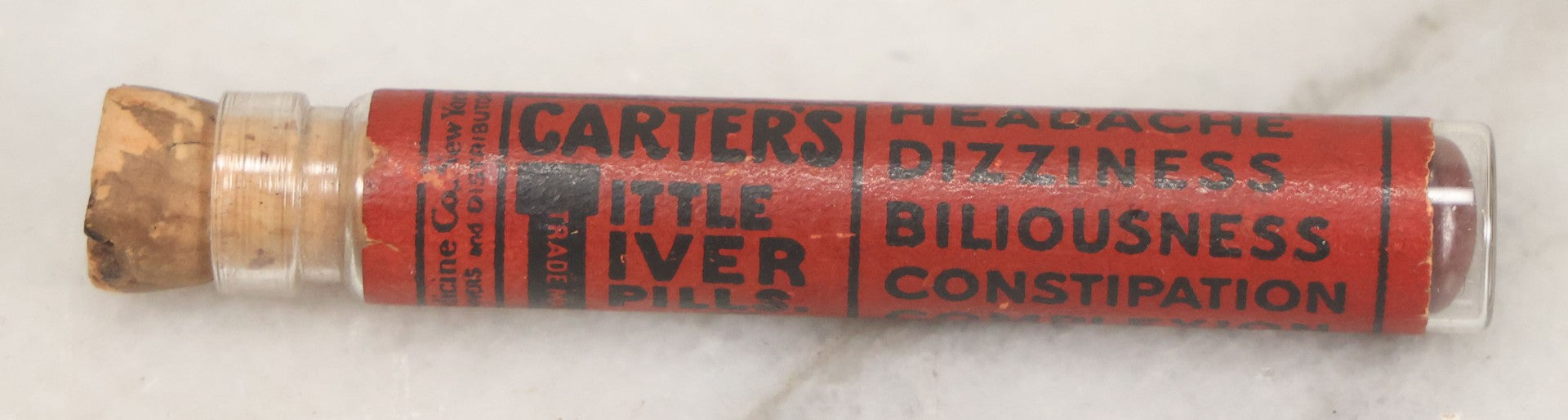 Lot 100 - Grouping Of Three Antique Medicine Pill Vials With Original Paper Labels, Corks, And Contents, Including Humphrey's Homeopathic No. 35., Burdock Pills, And Cartier's Little Liver Pills