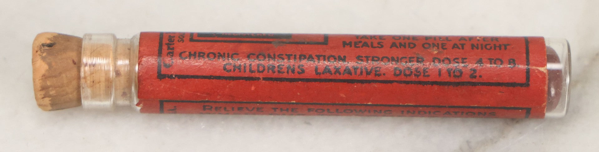 Lot 100 - Grouping Of Three Antique Medicine Pill Vials With Original Paper Labels, Corks, And Contents, Including Humphrey's Homeopathic No. 35., Burdock Pills, And Cartier's Little Liver Pills