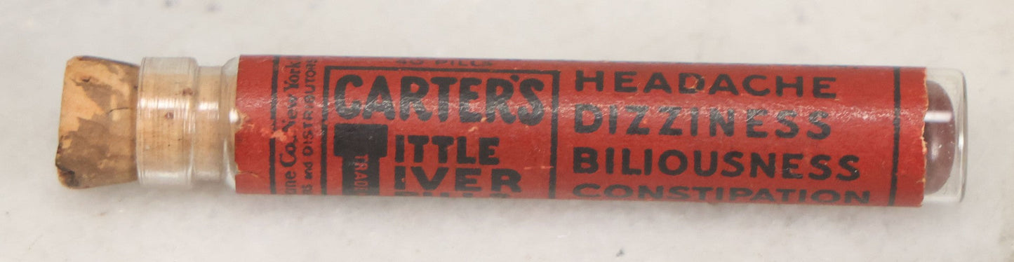 Lot 100 - Grouping Of Three Antique Medicine Pill Vials With Original Paper Labels, Corks, And Contents, Including Humphrey's Homeopathic No. 35., Burdock Pills, And Cartier's Little Liver Pills
