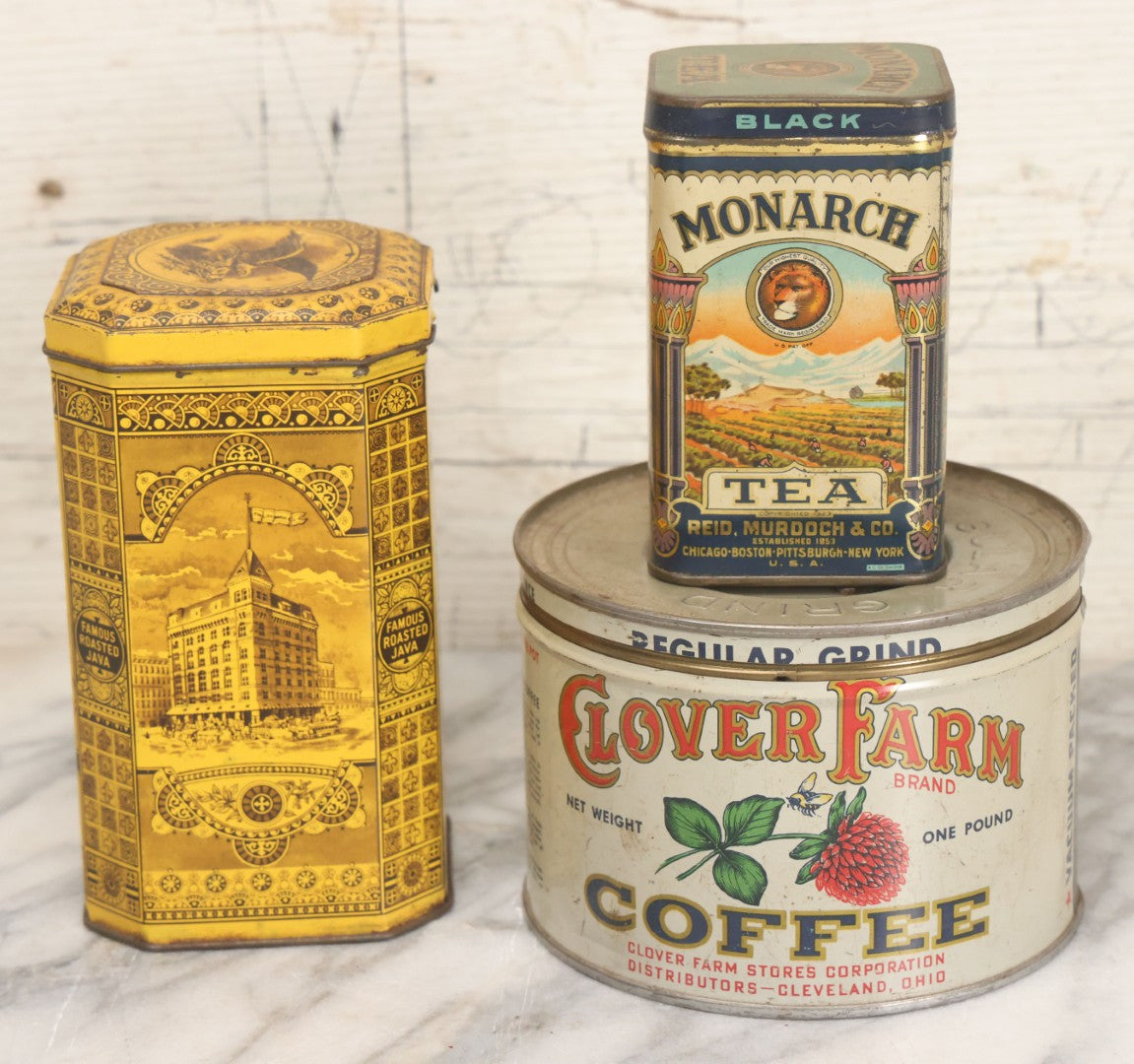 Lot 102 - Grouping Of Three Vintage Lithographed Advertising Tins Including Monarch Tea, Clover Farm Coffee, And Franklin's Famous Java Coffee