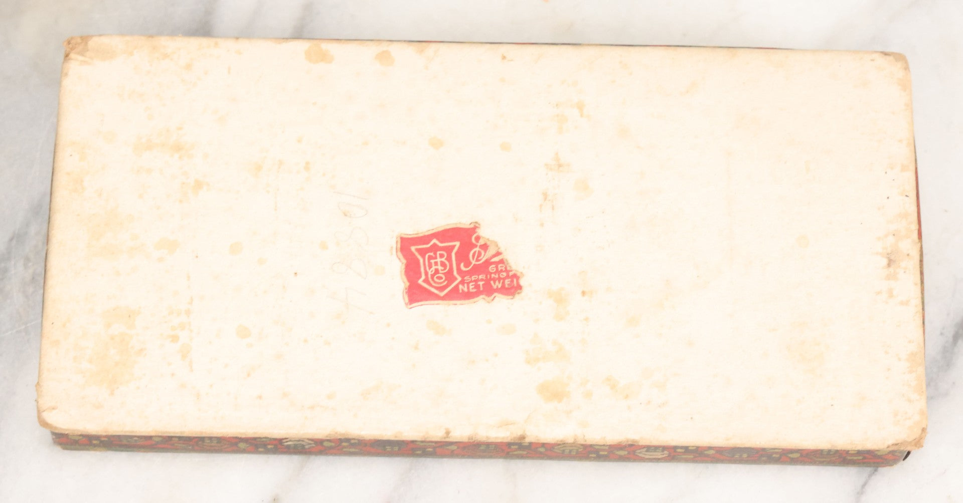 Lot 105 - Antique Paper Board Candy Box With Lithograph Wrapped Lid With Exotic Woman Graphics, Paper Label On Bottom From G.B. Co., Springfield, Massachusetts