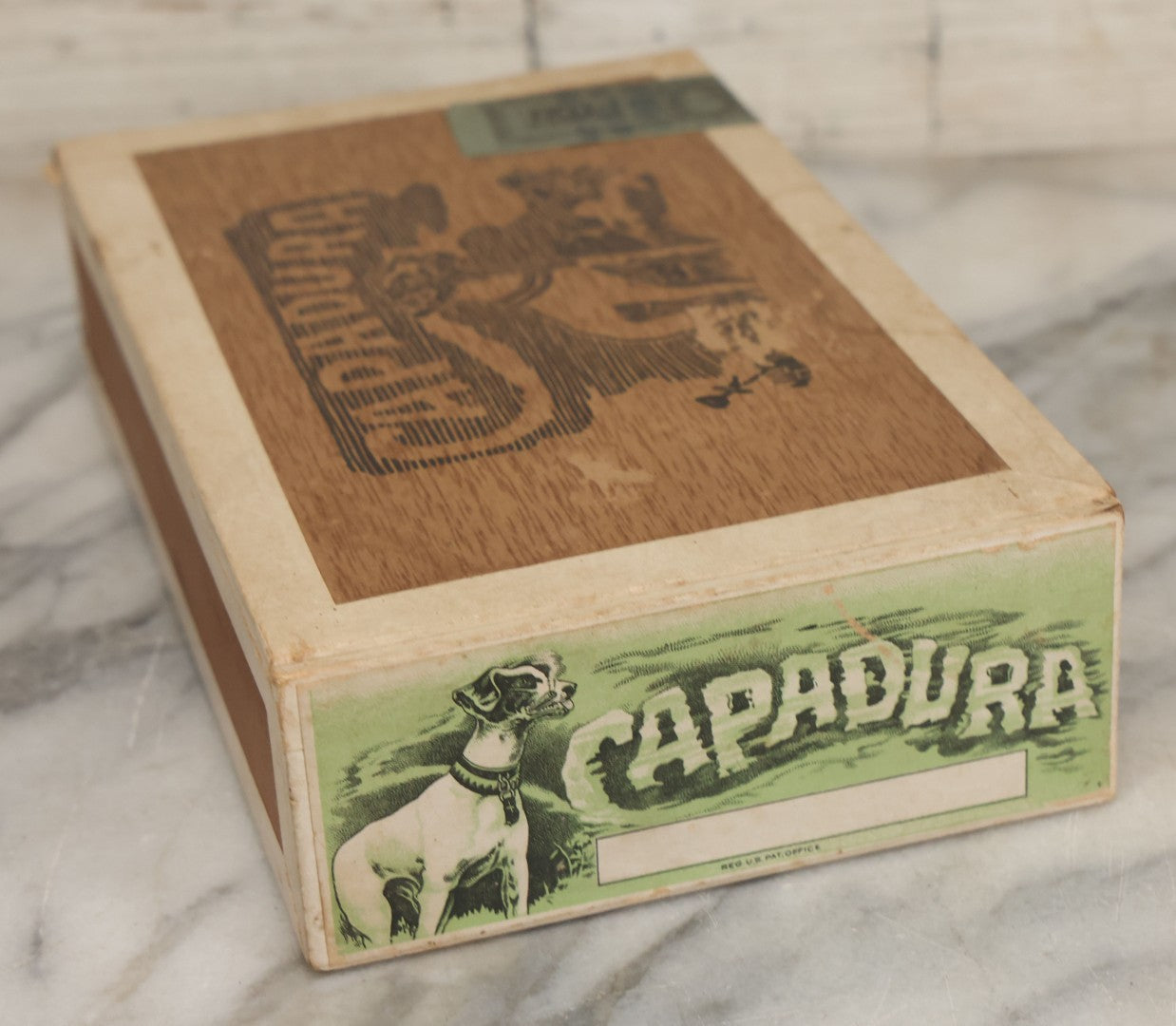 Lot 111 - Antique Wooden Cigar Box For "Capadura" Cigars, With Lithographed Interior And Exterior Labels With Jack Russell Terrier Dog Graphics