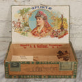 Lot 113 - Antique Wooden Cigar Box For "Flirt" Cigars, With Lithographed Interior And Exterior Labels With Extravagantly Dressed Exotic Woman Graphics, Lithographed By L.E. Neuman & Co., New York