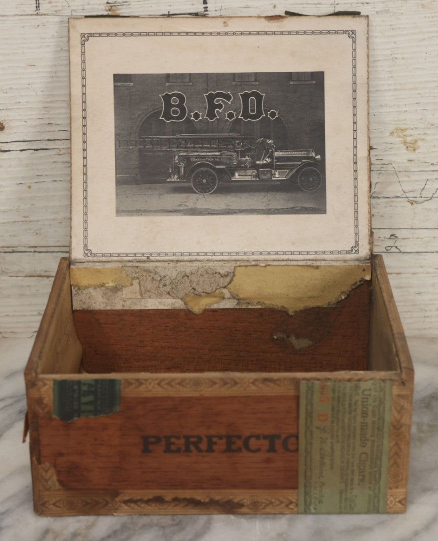 Lot 114 - Antique Wooden Cigar Box For "B.F.D." Cigars, Sold By Wilfred F. Root, Pharmacist, Brattleboro, Vermont, With Lithographed Interior And Exterior Labels With Brattleboro Combination No. 1 Fire Engine Graphics